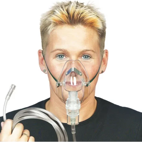 Oxygen mask with nebulizer chamber and oxygen tube